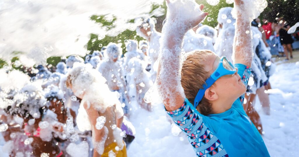 Child at a foam party