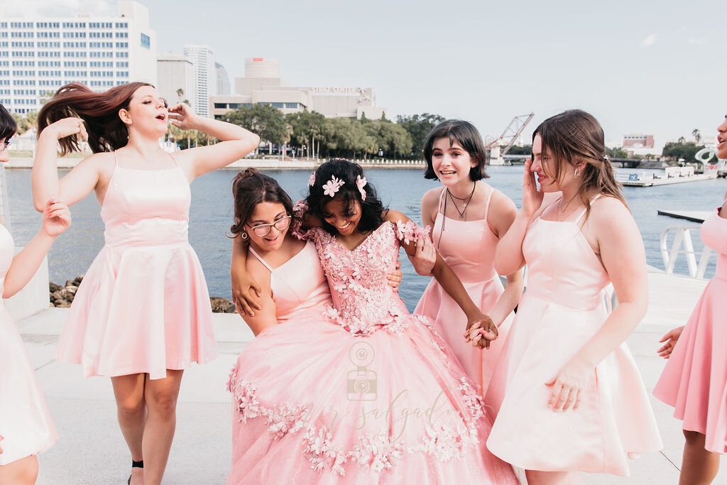 Girls in beautiful dresses having fun