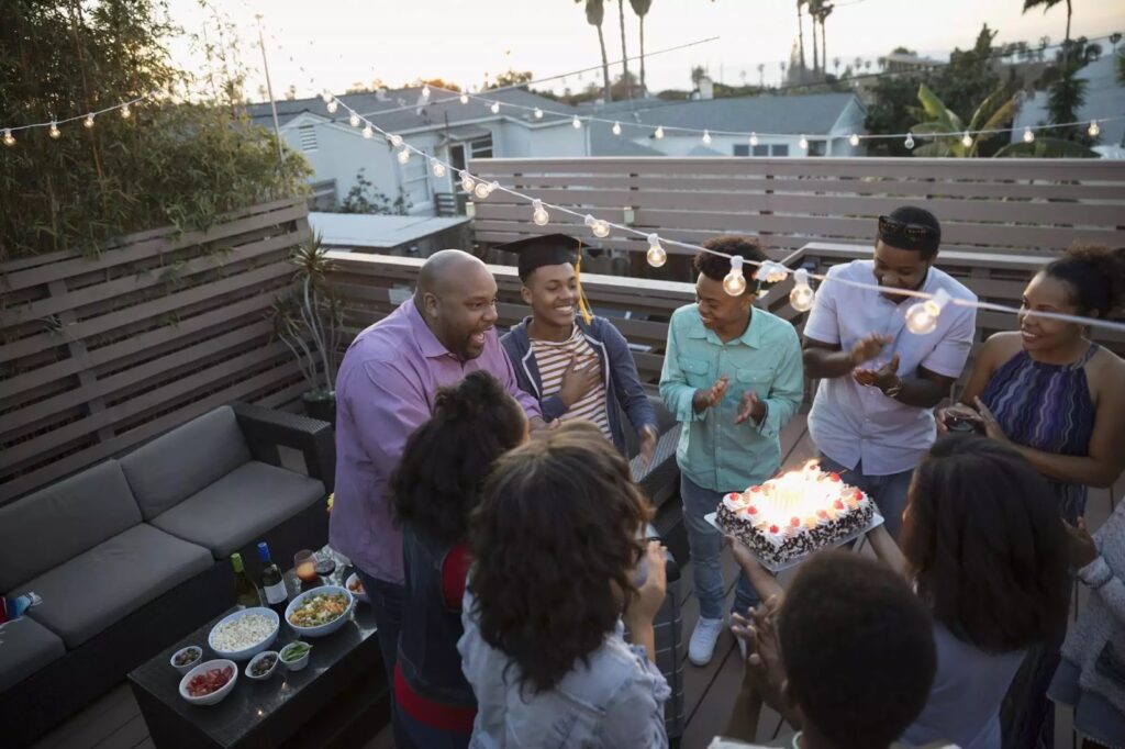 People celebrate graduation on the roof