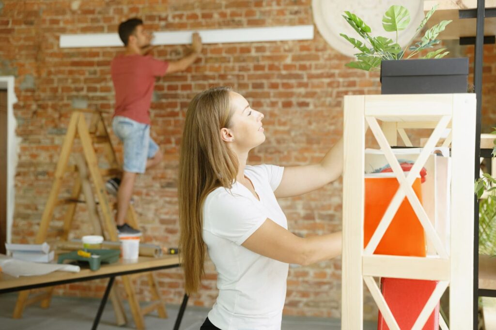 Couple setting up a garage together