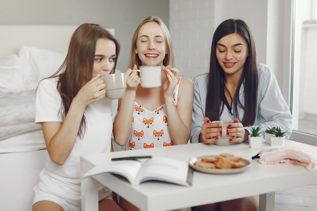 Girls drinking tea in pajamas